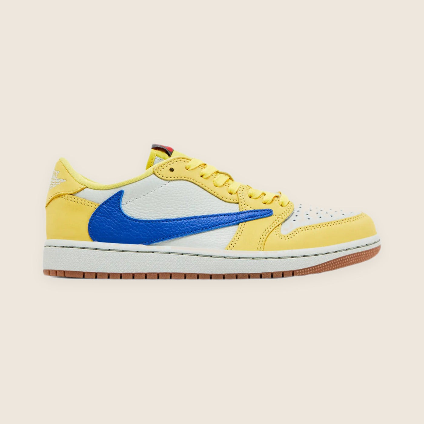 Jordan 1 Low Travis Scott — Jaune et bleu
